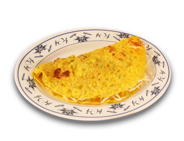 A plate of Banh Xeo, or Vietnamese Country Style Crepes showing the yellow crepe folded over with some bean sprouts sticking out of the open edges, the plate a bone colored ceramic with dark monochrome floral patterns around the edge, floral pattern consisting of lilies and lotuses