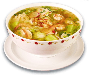 A bowl of Mi Sup or Yellow Noodle Soup from Noodle House in Sacramento, authentically cooked with shrimp, dumplings, egg noodles and vegetables such as baby bok choy for a delicious flavor.